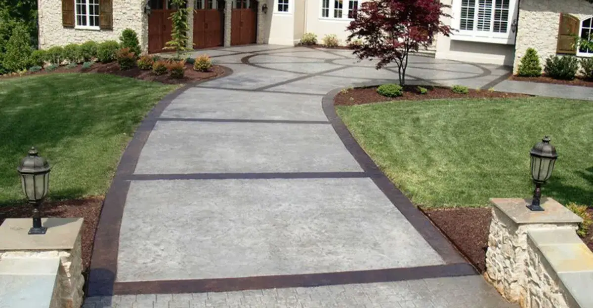 Coated concrete walkway with decorative border bands