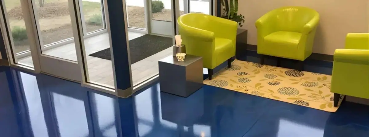 Office lobby with chairs on a glossy blue coated floor